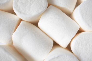 Makro yumuşak beyaz şekerleme dokusu. Bir yığın tatlı yemek, en iyisi.