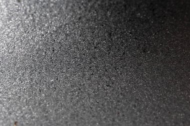 Seçici odaklı gümüş parıltılı arka plan. Yeni Yıl