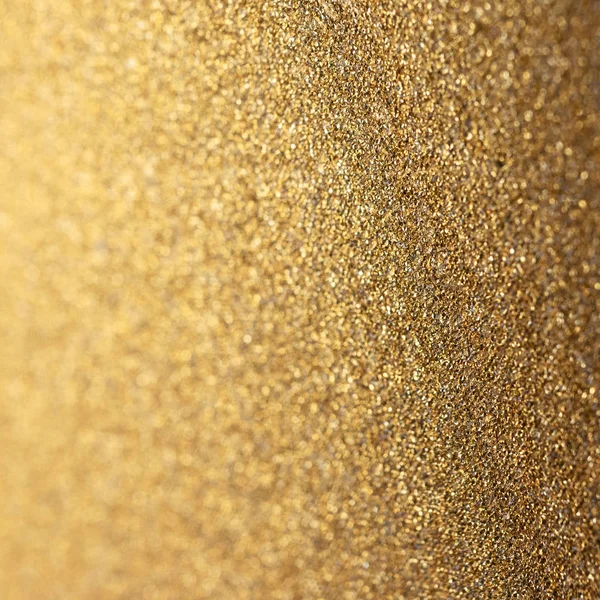 Gyllene glitter glänsande bakgrund. Nytt år eller julinslagning — Stockfoto