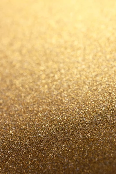 Złoty brokat błyszczące tło z selektywną ostrością. Nowy Rok o — Zdjęcie stockowe