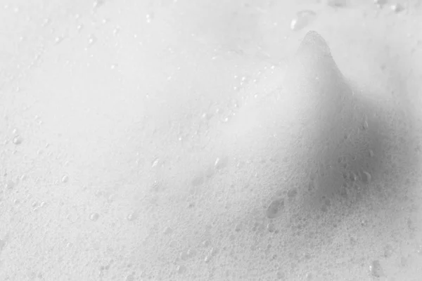 Sabun köpüğünden beyaz zirve ya da fotokopi alanı ile şampuan köpüğü