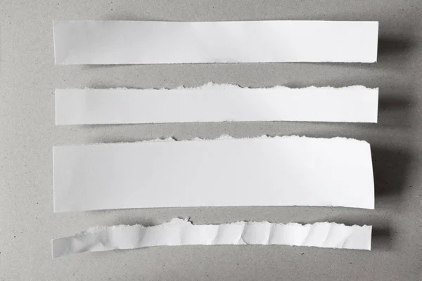 Weiße Zerrissene Blankoscheine Ein Satz Zerrissenes Papier Auf Grauem Hintergrund — Stockfoto