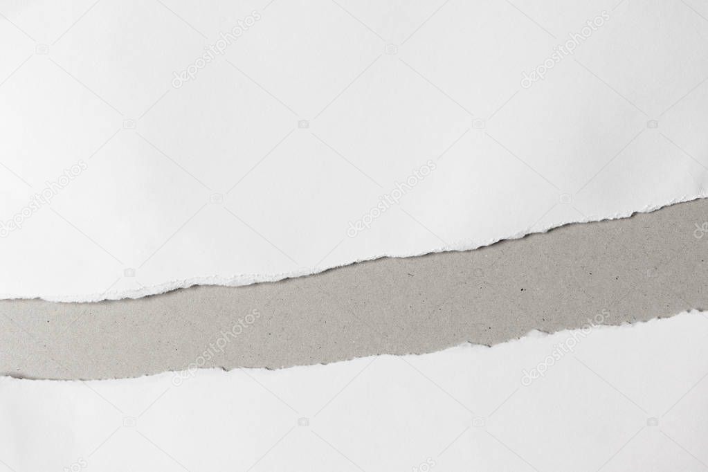 Torn edge line hole of paper on gray background with copy space,