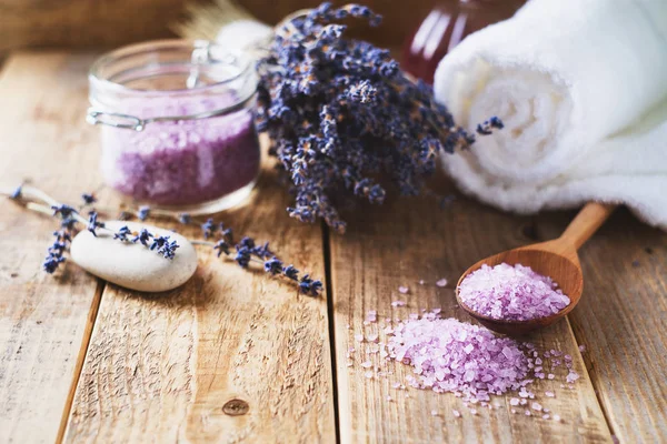 Lavander salt with natural spa products and decor for bath