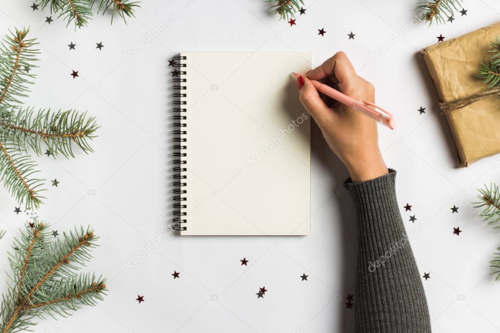 Goals plans dreams make to do list for new year christmas concept writing