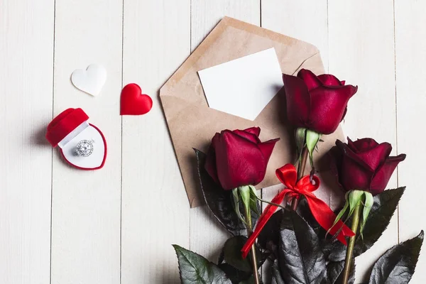 Valentines day envelope love letter with greeting card engagement ring — Stock Photo, Image