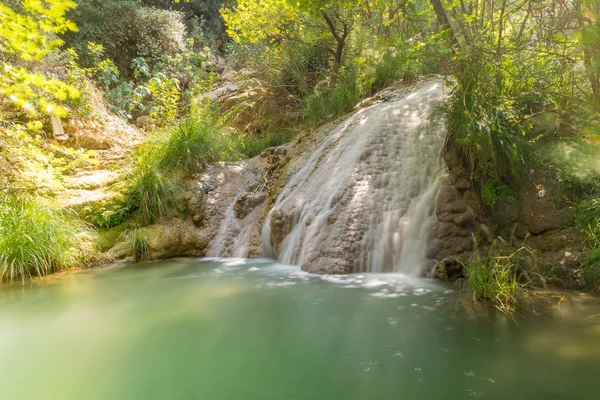 Waterfall at Polilimnio in Peloponnese. A famous touristic destination. — Stock Photo, Image