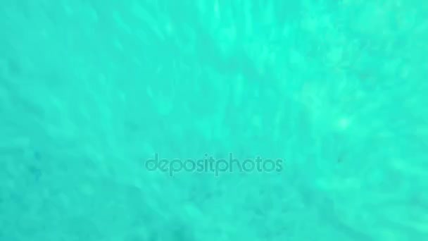 Water bubbles from pool in slow motion. — Stock Video