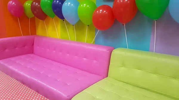 Kids party at a kindergarten. Colorful background.
