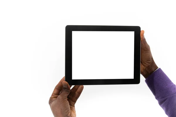 African man holding a tablet computer in his hand — ストック写真