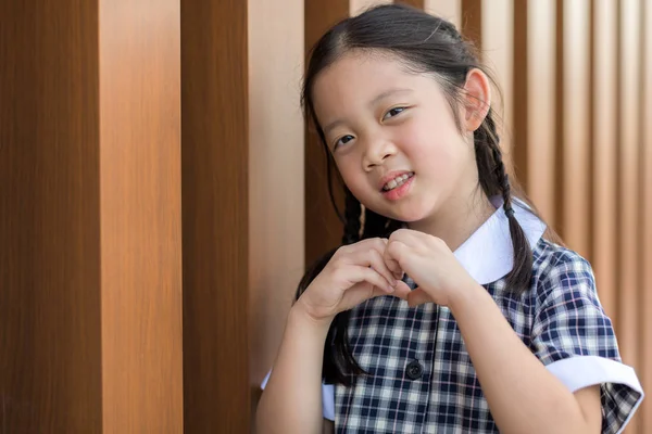 Criança, menina, em uniforme escolar — Fotografia de Stock