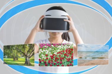 VR veya sanal gerçeklik kavramı Vr kulaklık giyen Asyalı çocuk tarafından gösterilen yerlere seyahat için