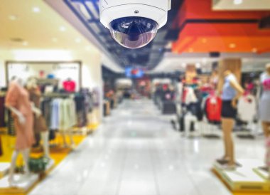 Cctv güvenlik kamera mağaza arka plan üzerinde alışveriş.