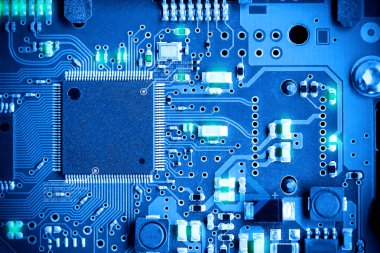 Close-up electronic circuit board. technology style concept. clipart