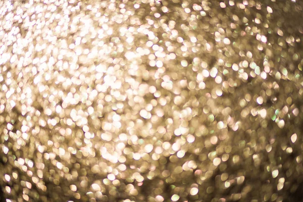 Soyut bulanık altın bokeh ışıklar defocused. — Stok fotoğraf