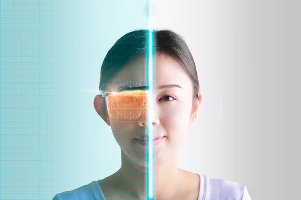 Woman eyes control and security in the accesses with futuristic — Stock Photo, Image