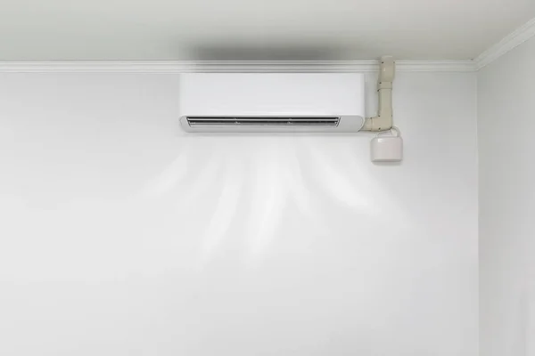 Air conditioner blowing cold air in the room.