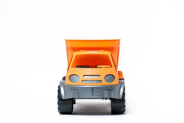 Orange plastic toy truck for kids isolated on white background — Stock Photo, Image