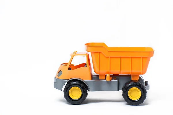 Orange plastic toy truck for kids isolated on white background — Stock Photo, Image