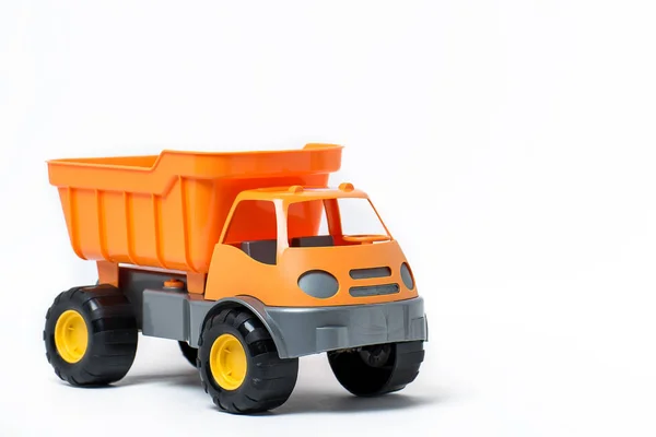 Orange plastic toy truck for kids isolated on white background — Stock Photo, Image