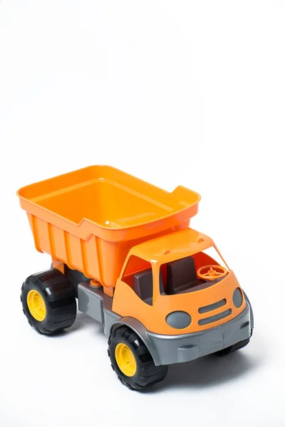 Plastic orange toy truck on white background — Stock Photo, Image