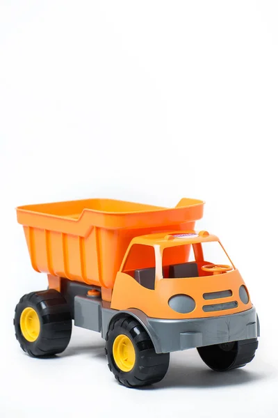 Plastic orange toy truck on white background — Stock Photo, Image