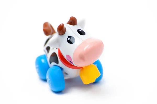 Plastic toy cow on a white background — Stock Photo, Image