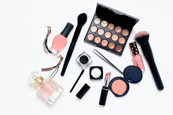 The makeup and accessories on a white background