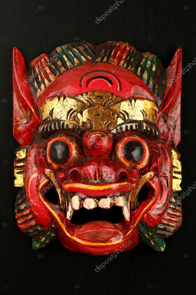 Masque asiatique traditionnel en bois rouge peint démon