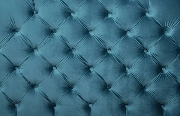 Green capitone tufted fabric upholstery texture Stock 
