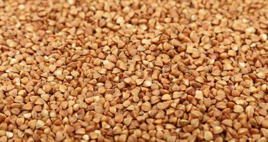 Kurutulmuş kahverengi karabuğday kabuğu çıkarılmış tane arka kapatmak