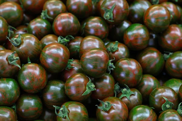 Verde Kumato tomates cherry patrón de fondo — Foto de Stock