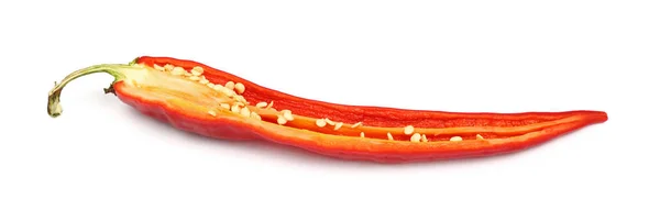 Eine geschnittene rote Chilischote in Nahaufnahme auf weißem — Stockfoto