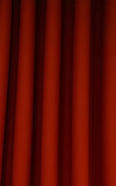 Heavy dark red pleated felt curtain background — Stock Photo, Image