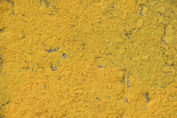 Yellow painted rough concrete wall texture — Stock Photo, Image