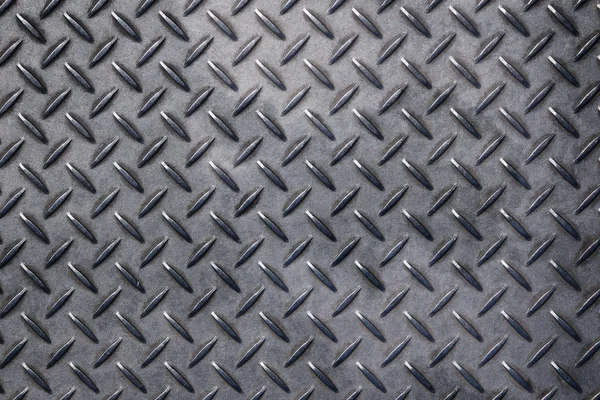 アンチ スリップ ダイヤモンド パターンを持つ灰色の金属板 — ストック写真