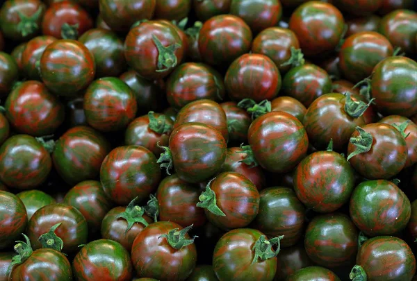 Verde Kumato tomates cherry patrón de fondo — Foto de Stock