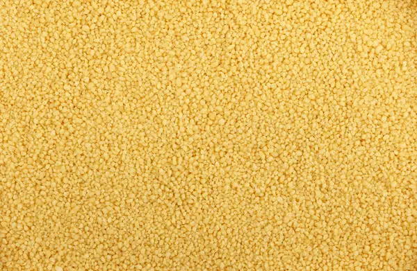 Couscous grain close up background — Stock Photo, Image