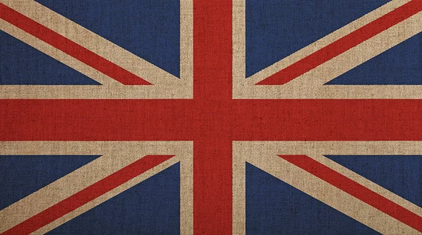 Old vintage faded UK Great Britain flag over canvas — Stock Photo, Image