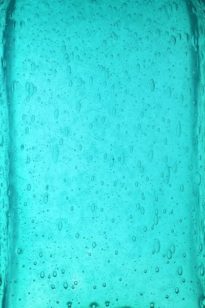 Bakgrundsstruktur Teal blått glas med bubblor — Stockfoto