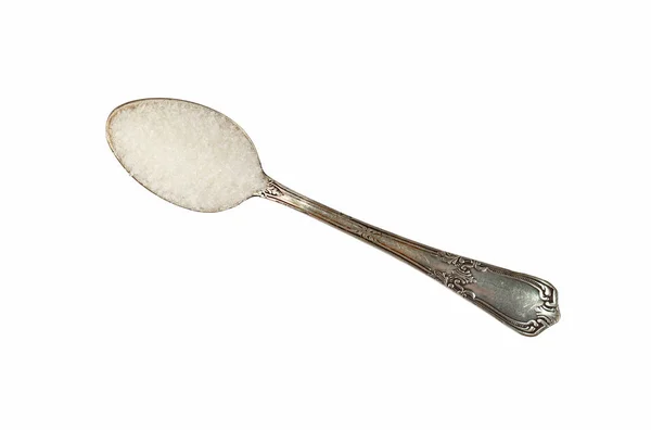 Cucchiaio di metallo vintage pieno di zucchero bianco isolato — Foto Stock