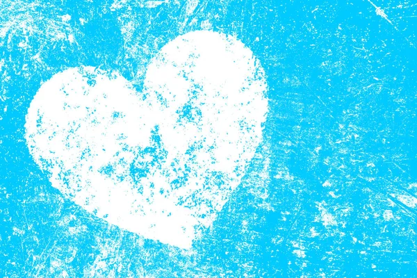 Grunge bílé srdce na modrém pozadí — Stock fotografie