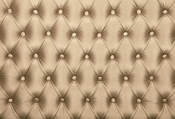 Textura de estofos de tecido tufado capitone bege — Fotografia de Stock
