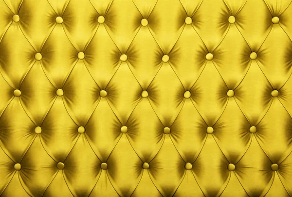 Textura de estofos de tecido tufado capitone amarelo — Fotografia de Stock