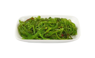 Yeşil wakame deniz yosunu salata bölümünü yedeklemek kapatın