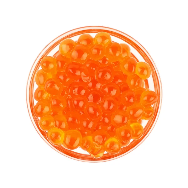 Cerrar cuenco de vidrio de caviar de salmón rojo sobre blanco —  Fotos de Stock