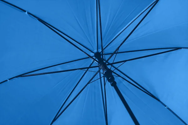 Close up blue umbrella low angle view — Stock Photo, Image