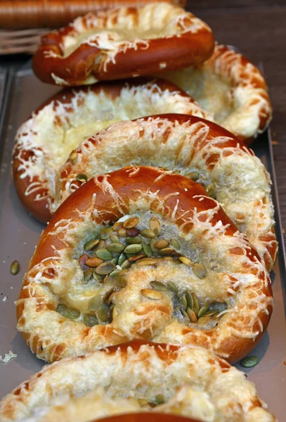 Close Several Fresh Traditional German Pretzel Bread Knots Cheese Retail — Stock Photo, Image