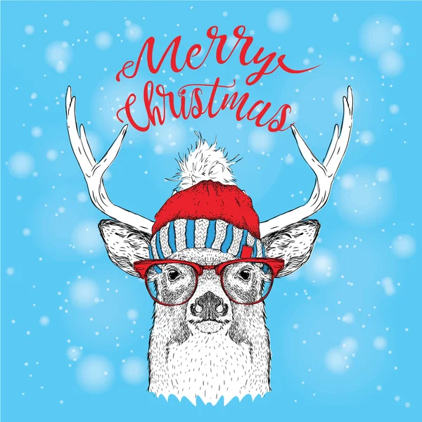 Kartki świąteczne z jelenia w Czapka zimowa. Wesołych Świąt napis design. Ilustracja wektorowa — Wektor stockowy