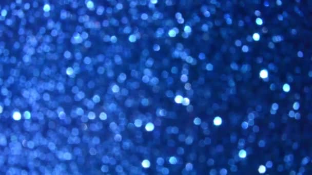 Spostamento lento glitter sfocato bokeh luci di sfondo, alla moda classico blu caotico riflessi casuali — Video Stock